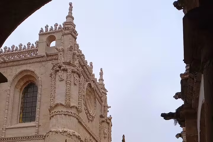 Intricate architectural details of a historic building in Tomar, part of the Tomar-Coimbra tour experience.