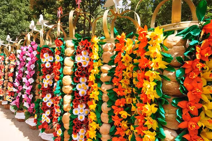 Vibrant floral displays at Tomar's traditional festival, showcasing colorful flower arrangements in the medieval town.