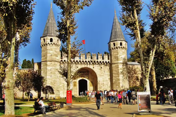 Entrance of Topkapi Palace in Istanbul with visitors, featured on skip-the-line private full-day guided tour