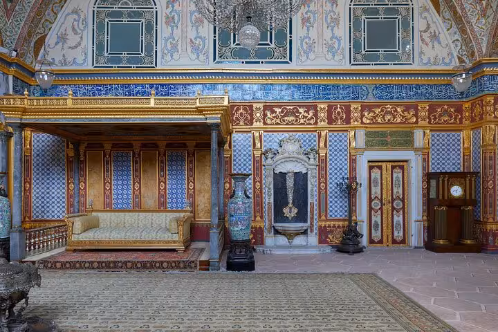 Ornate Topkapi Palace interior with gilded decor and chandelier, Istanbul culture and history half-day tour