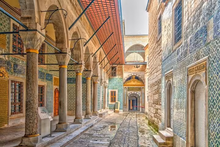 Topkapi Palace courtyard tiles and arches in Istanbul, explored on a private car tour with guide