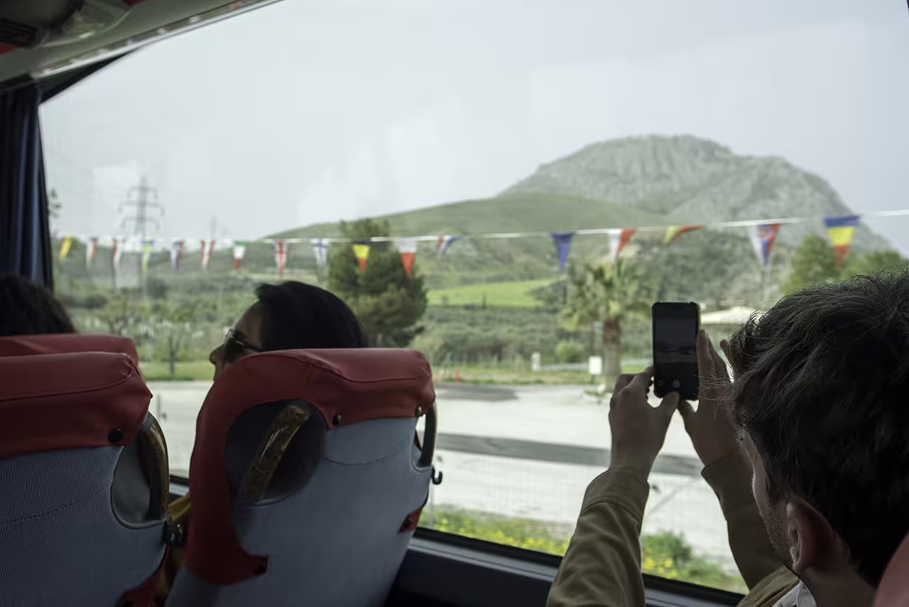 Tour bus ride through the Peloponnese en route to Ancient Corinth and Nafplion on a full-day guided tour