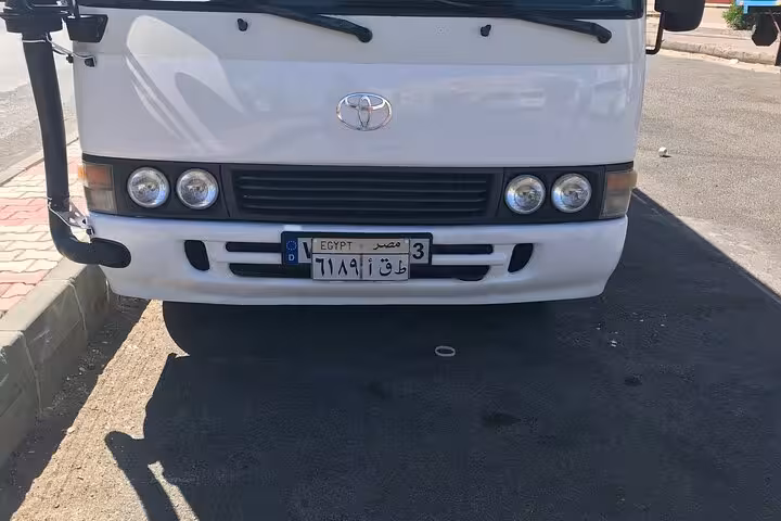 Toyota minibus for Hurghada transfer, shared airport shuttle in Egypt with air-conditioned transport