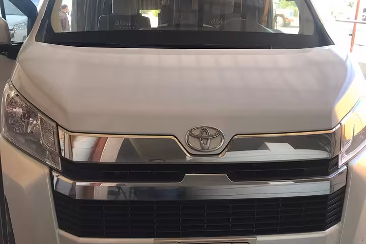 Close-up of Toyota shuttle van for Hurghada transfer, comfortable private airport transfer and resort transportation