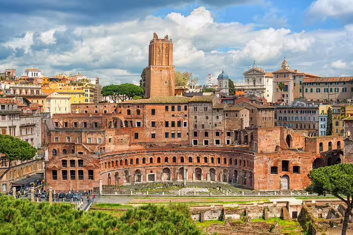 Panoramic view of Trajan’s Market and Imperial Forums on guided Rome and Vatican City tour with round-trip transfer from Civitavecchia