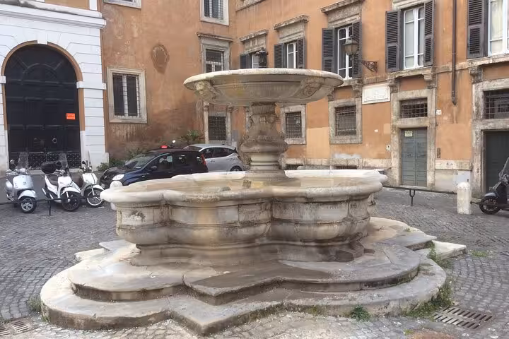Historic fountain in Trastevere, Rome, a key highlight on the Trastevere Food Tour Prime Edition.