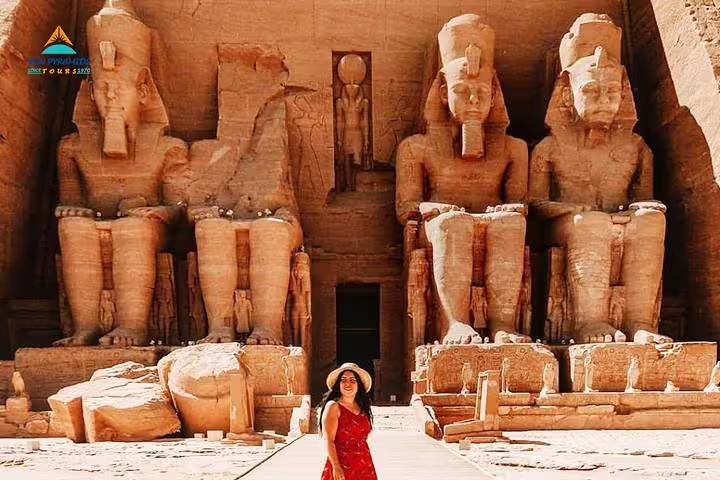 Traveler at Abu Simbel Great Temple of Ramses II on Cairo to Abu Simbel road tour, 8 days 7 nights