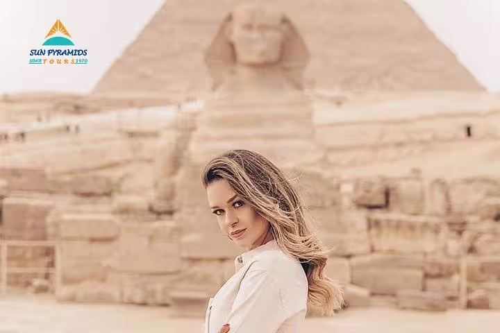 Traveler at Great Sphinx and Giza Pyramids, highlight of 15 days 14 nights Holy Family Tour in Egypt