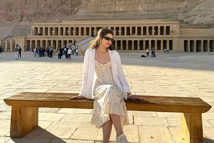 Traveler at Hatshepsut Temple on comfort Luxor tour from Hurghada with King Tut tomb Valley of the Kings