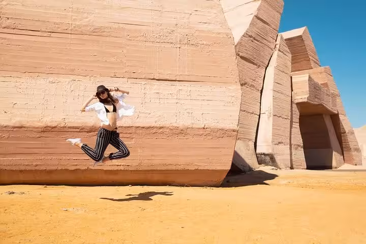 Traveler jumping by Allah’s Gate at Ras Mohamed National Park, Sharm El-Sheikh half-day sightseeing tour