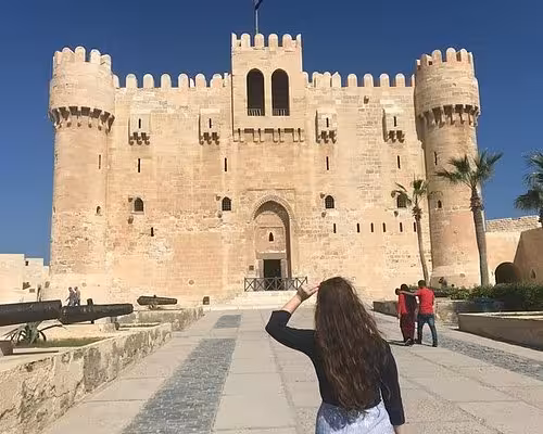 Traveler at Qaitbay Citadel in Alexandria, highlight of 2-day private tour from Cairo to Alexandria Egypt