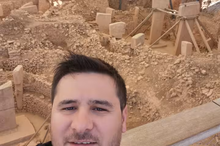 Traveler selfie at Göbeklitepe excavation site in Şanlıurfa, part of private Göbeklitepe tour from Istanbul by plane