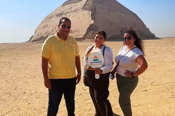 Travelers posing at Dahshur Bent Pyramid, Cairo day trip combining Dahshur pyramids and Memphis city tour