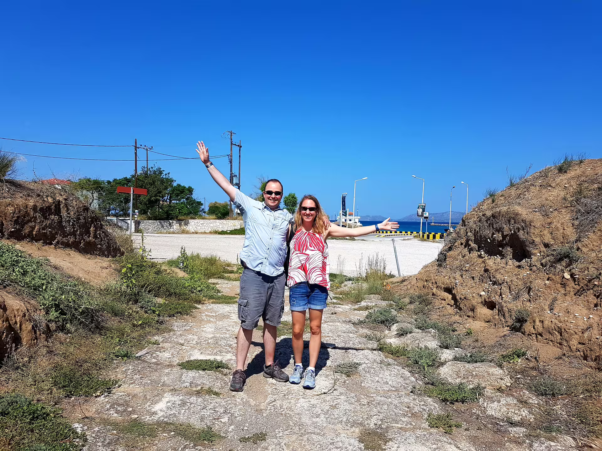 Travelers at the Isthmus Canal viewpoint on a private biblical day tour from Athens to Ancient Corinth