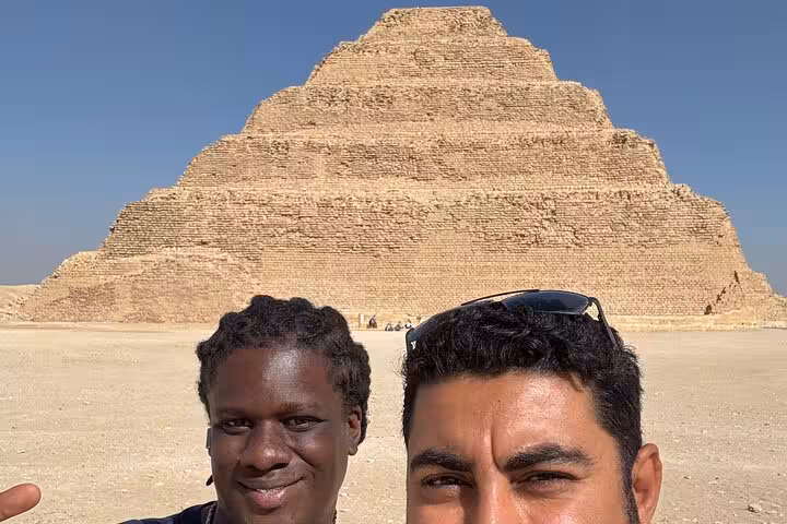 Travelers at Saqqara Step Pyramid on a private tour from Cairo to Giza Pyramids, Memphis and Saqqara