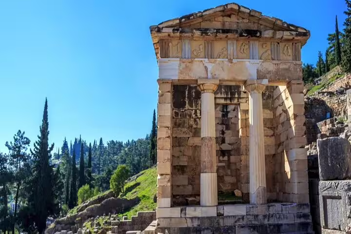 Treasury of the Athenians at Delphi archaeological site, highlight on Delphi private full-day tour from Athens