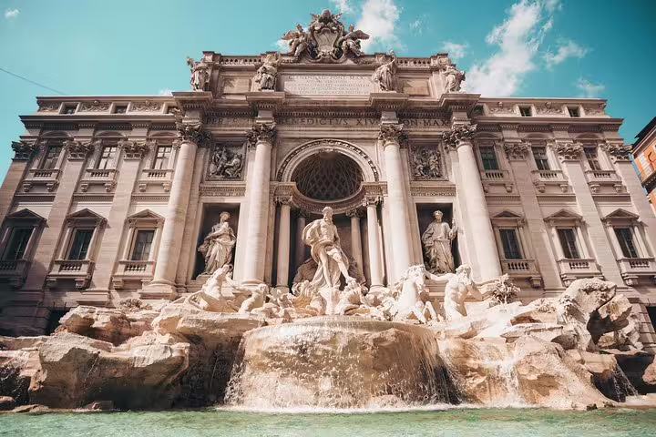 Trevi Fountain with baroque sculptures and cascading water in Rome, Italy