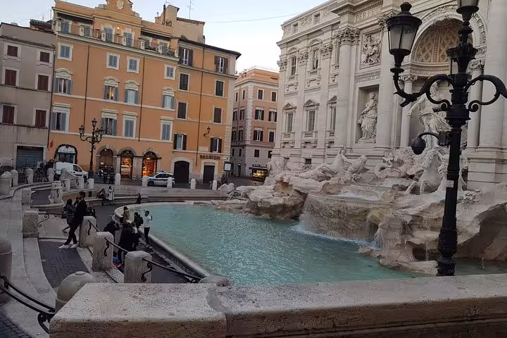 Trevi Fountain in Rome at dusk, iconic stop on 10-day private Italy tour from Rome to Venice
