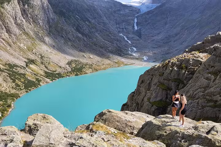 Turquoise Triftsee lake view near Trift Suspension Bridge hike, scenic Zurich day trip in the Swiss Alps
