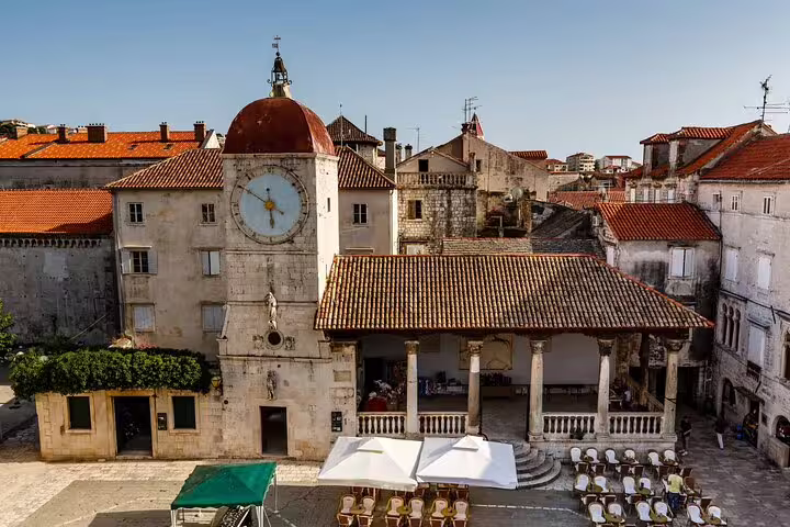 Trogir Old Town clock tower and stone square, a highlight stop on Krka Waterfalls and Trogir private tour