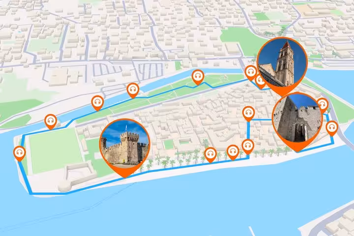 Self-guided audio walking tour map of Trogir showing highlighted landmarks including Kamerlengo Castle and Cathedral