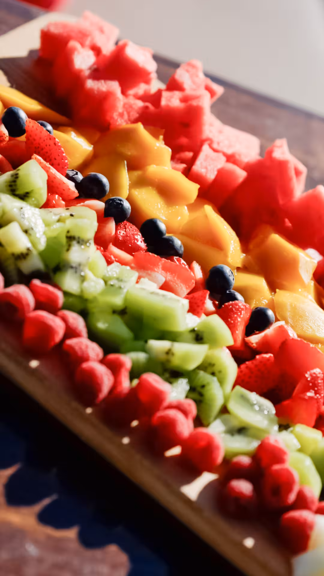 Fresh tropical fruit platter on board, healthy snacks for Wellness & Sea Breeze yacht tour by the sea