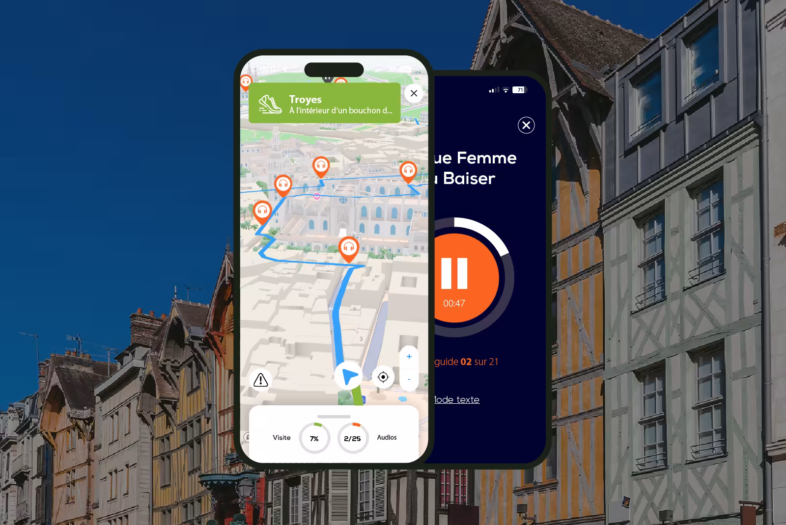 Troyes audioguide mobile application interface on smartphone with half-timbered houses in the background.
