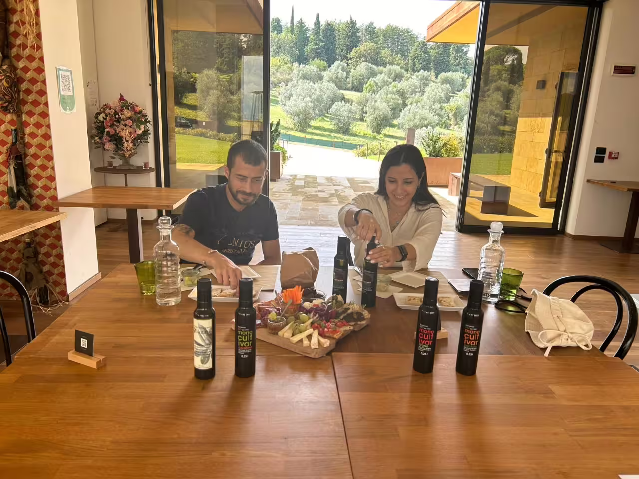 Guests tasting olive oil and local bites during the truffle experience at Frantoio Buonamici in Fiesole