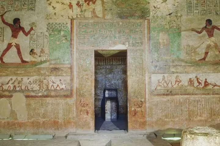 Ancient Egyptian tomb wall paintings at Tuna El Gabal, highlight of private 2-day El Minya tour from Cairo