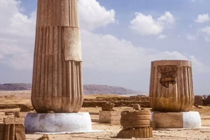 Ruins of ancient columns at Tuna el-Gebel, El Minya day tour from Cairo by private car in Egypt