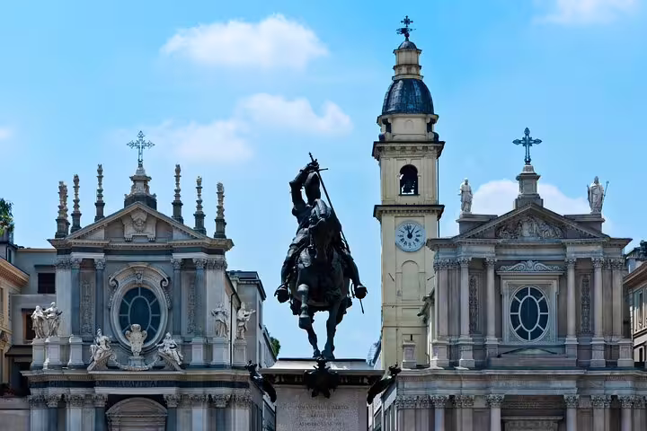 Turin self-guided scavenger hunt at Piazza San Carlo with equestrian statue and twin churches, city highlights