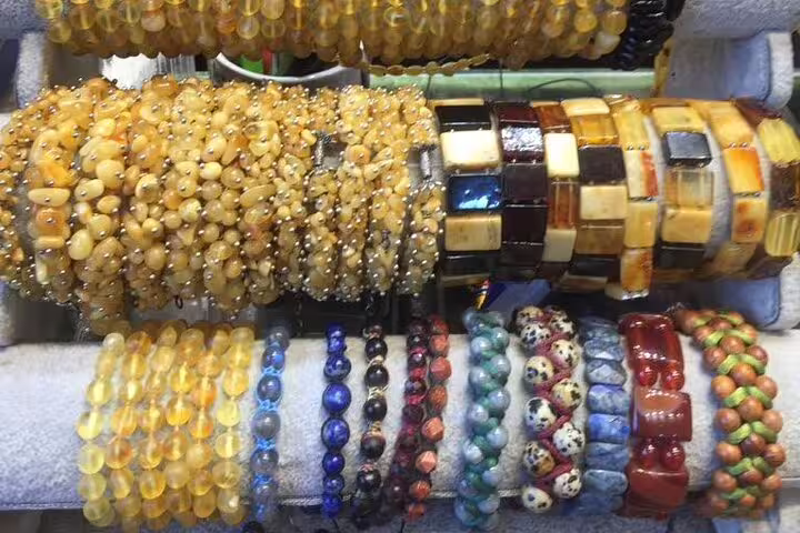 Turkish amber and gemstone bracelets at Istanbul bazaar, shopping stop on private 10-day guided tour