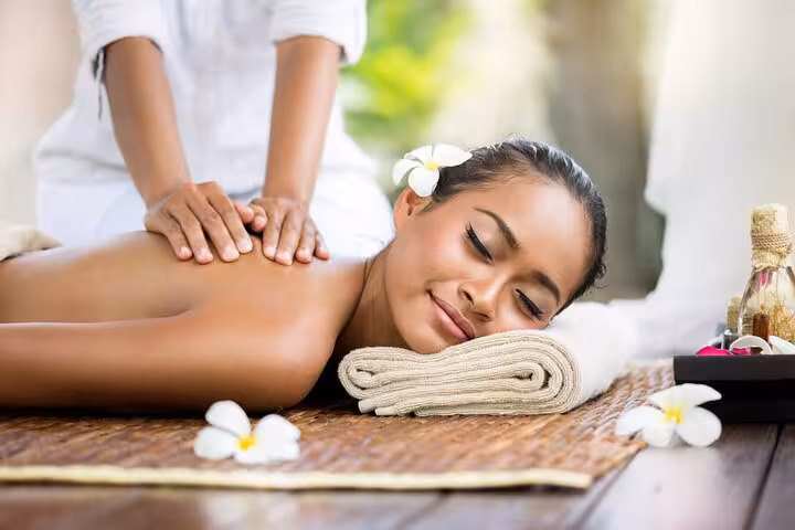 Woman enjoying full body massage after Hurghada Turkish bath, with sauna, steam and jacuzzi wellness package