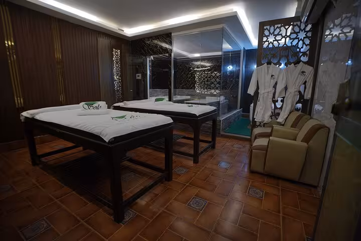 Couples massage room at Turkish bath spa in Sharm El Sheikh with treatment beds and robes ready