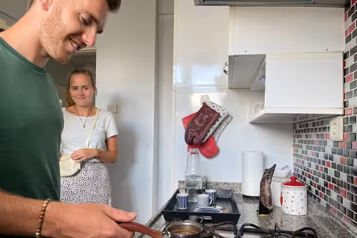 Traveler learns Turkish coffee making in an Istanbul home kitchen, preparing cezve brew for a local tasting