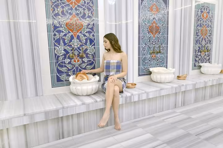 Turkish bath hamam in Kusadasi with marble basins and Ottoman tiles, part of private Ephesus tour