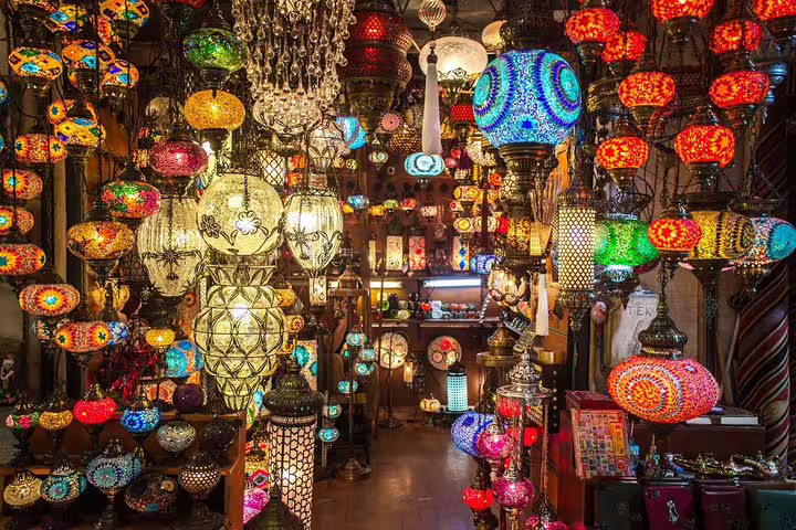 Hanging Turkish mosaic lamps in Grand Bazaar shop, highlight of Istanbul 7-hour private tram tour