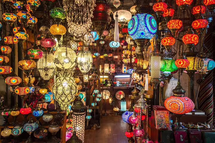 Colorful Turkish mosaic lamps in Istanbul bazaar shop, popular stop on private mini group cruise shore tour