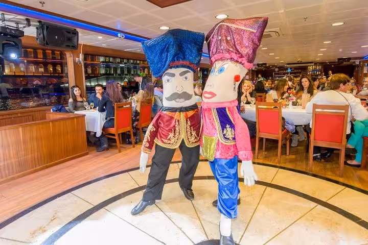 Traditional Turkish Night mascots on boat dinner cruise, fun live show entertainment during dinner on board