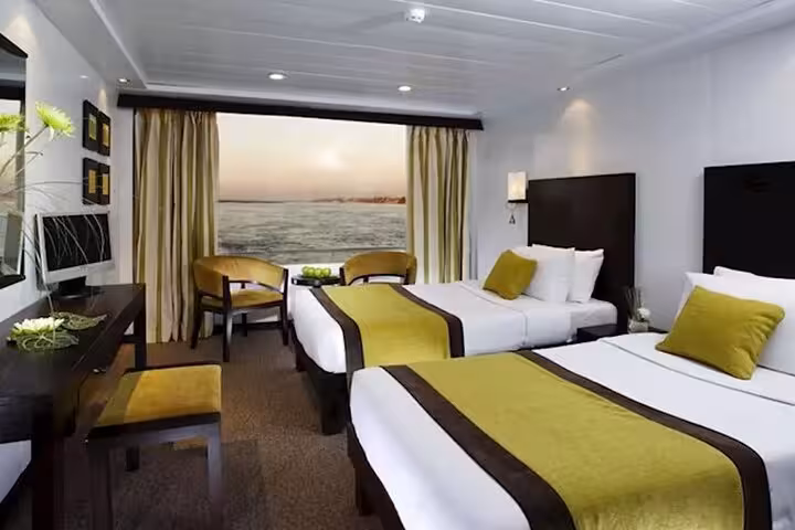 Twin cabin with Nile view on 6 day Aswan to Luxor Nile cruise, modern room included with domestic flight