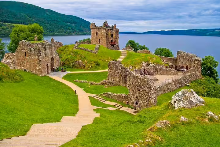 Urquhart Castle ruins overlooking Loch Ness, iconic stop on a private scenic Highlands legends tour