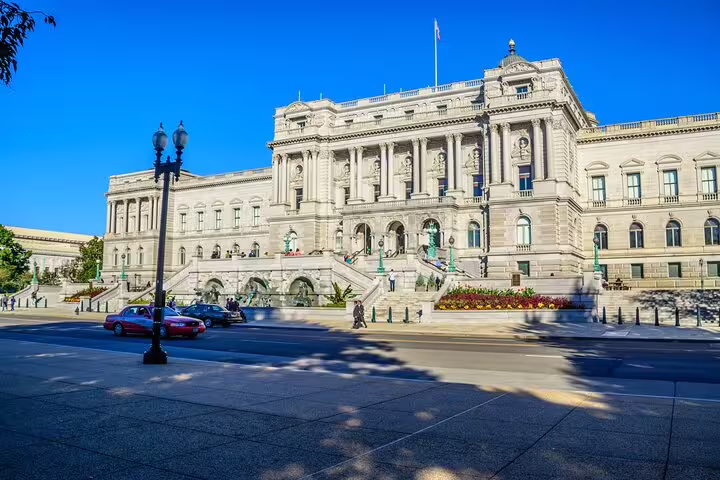Library of Congress building exterior with grand staircase and columns on a sunny day in Washington DC