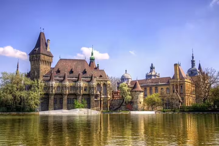 Vajdahunyad Castle by City Park lake, highlight of an Explore Budapest private sightseeing experience with a local