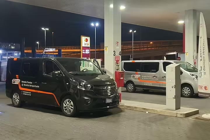 Professional private transfer vans ready for airport pickup service at Valencia VLC Airport night transfer