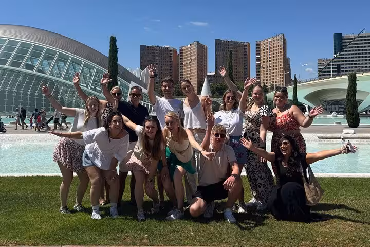 Group photo on Dutch Valencia bike tour at City of Arts and Sciences, sunny guided city cycling