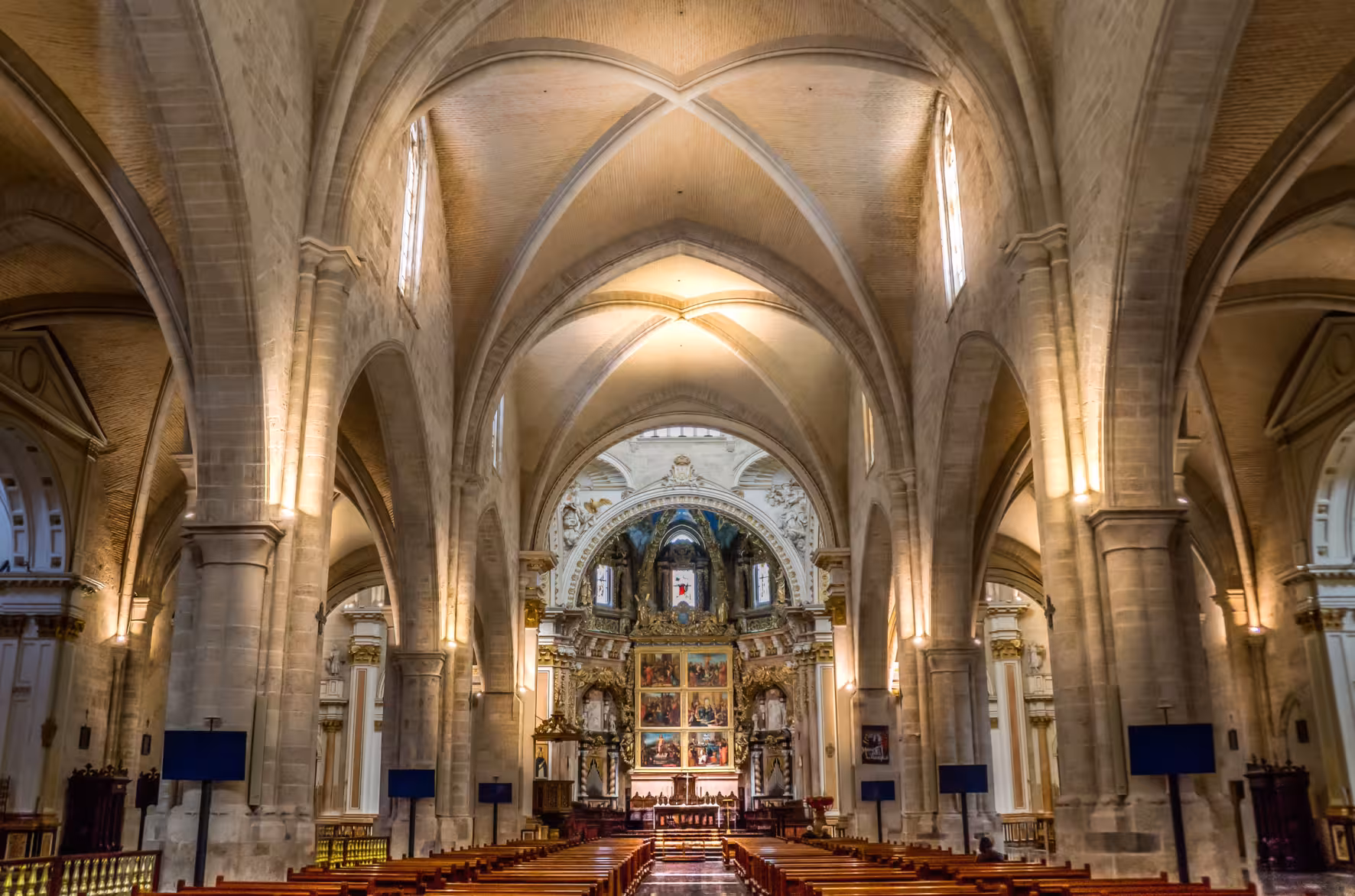 Valencia Cathedral nave with vaulted arches and main altar, highlight of Leyendas Locales and Holy Grail tour