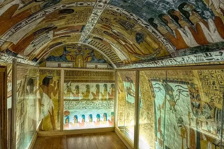 Intricate hieroglyphic murals inside a Valley of the Kings tomb, showcasing Luxor's rich ancient Egyptian heritage.