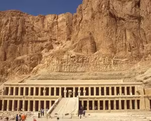 Mortuary Temple of Hatshepsut with towering limestone cliffs in Valley of the Kings, Luxor Egypt