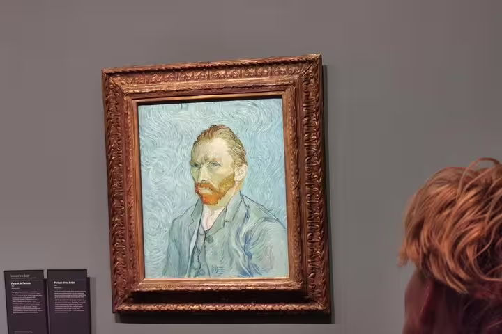 Van Gogh portrait painting in museum, highlight of Auvers-sur-Oise on a private day tour from Paris