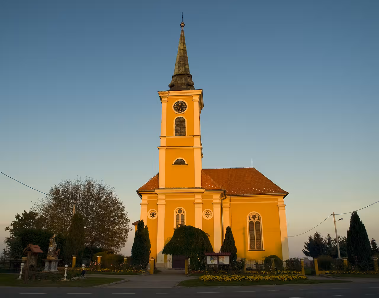 Varaždin Baroque church with clock tower at sunset, highlight of Trakošćan Castle and Varaždin day trip